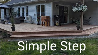 How to build a simple step for a ground level deck [upl. by Easter]