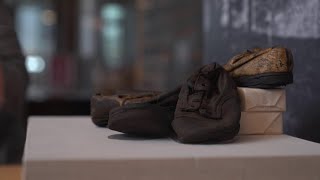 Dallas museum displays shoes recovered from concentration camp [upl. by Adamek]