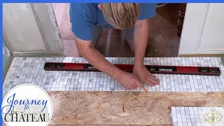 PLANNING and TILING the Marble Floor CHATEAU Bathroom RENOVATION  Journey to the Château Ep 123 [upl. by Cyprio561]