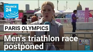 Mens Olympic triathlon race postponed over Seine pollution levels • FRANCE 24 English [upl. by Hakceber]