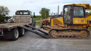 John Deere 650J Dozer side load [upl. by Hankins]