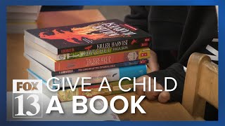 Annual book fair provides free books to students with the If You Give A Child A Book campaign [upl. by Seiber]