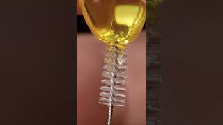 Omega3 and interdental brush satisfyingvideo experiment macro slowmotion [upl. by Notlil]