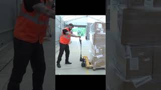 How to Safely Push a Pallet Truck  Manual Handling [upl. by Valleau650]