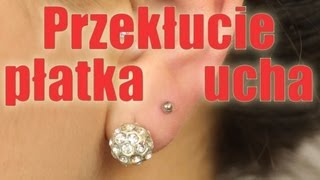 Piercing płatka ucha  kolczyki w uszach [upl. by Aihsercal]