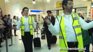 Flash Mob Choir A special Northern Ireland welcome  this is how we do it [upl. by Norrahs]