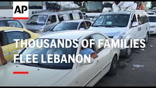 Thousands of families flee Lebanon pour into Syria [upl. by Ttereve]