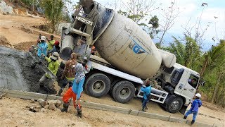 Extreme Concrete Paving On Steep Road By Hino 500 Ready Mix Cement Truck [upl. by Suivatna]