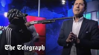 Armed men invade live TV broadcast in Ecuador [upl. by Colner430]