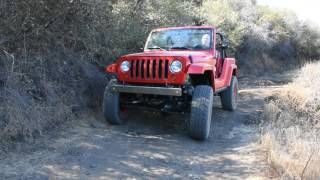 Jeep JK quotShort Cutquot concept vehicle tackling moguls [upl. by Naujed894]