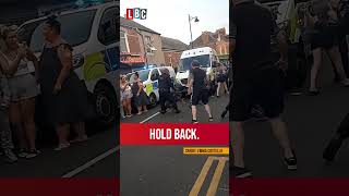 Rioter gets bitten on the arse by a dog while another gets bricked in the nuts  LBC [upl. by Millda743]