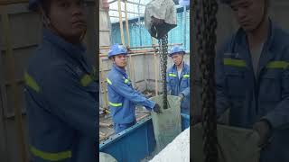 Workers put an electric hoist in a bag [upl. by Ennaj]