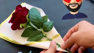 طريقة تغليف ورده بسيطة ، how to wrapping a bouquet of flowers [upl. by Eleonora]