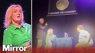 Liz Truss storms off stage after humiliating lettuce banner prank [upl. by Ymij276]