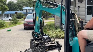 Chinese mini excavator loading suv on trailer [upl. by Nodanrb]