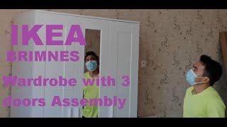 IKEA BRIMNES Wardrobe with 3 doors Assembly [upl. by Anrehs504]