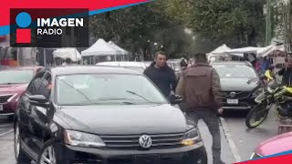 Pelea de automovilista y taxista en CDMX deja sus autos destrozados [upl. by Brawner345]