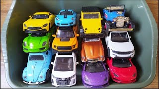 Box Full of model cars  Porsche Tesla Peugeot Volvo Closeup toy car review Tomica L108 [upl. by Llorre]