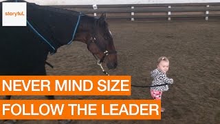 OneYearOld Girl Leads Trusting Horse on Friendly Walk Storyful Kids [upl. by Weissmann670]