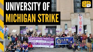 UMich docks pay calls cops on striking grad students  Working People [upl. by Oiralih589]