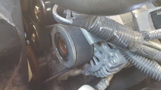 How to change the alternator overrunning clutch pulley and alternator on a D40 Navara [upl. by Atinev]