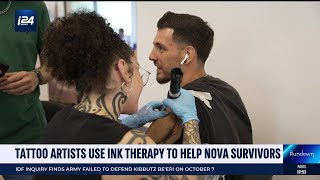 Tattoo artists help victims of October 7 with ink therapy – free body art [upl. by Felt]