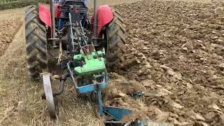 Massey Ferguson 135 with ransomes robin plough [upl. by Eelarak]