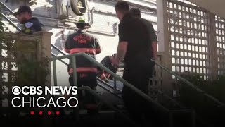 Car falls off secondfloor parking garage in Chicago suburb [upl. by Teodoro]