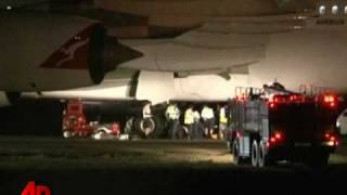 Qantas Superjumbo Damages Tires on Landing [upl. by Yramesor]