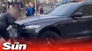 Road rage driver rams into cyclist and over bike in lawless London shorts [upl. by Glanti211]