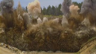 Blasting Crew Loading Explosives And Blowing Up Solid Rock At A Quarry from House Construction Ahead [upl. by Ieppet]