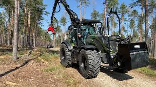 Valtra tractor equipped with Nisula 500H harvester head [upl. by Swihart]