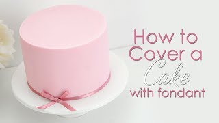 How to Prepare amp Cover a Cake with Icing  Fondant [upl. by Okihsoy]