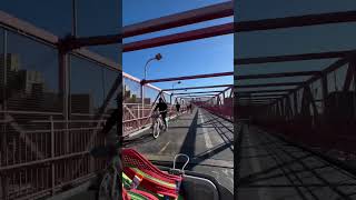 Biking the Williamsburg Bridge at 10x speed 🤠 citibike ebike NYC williamsburgbridge [upl. by Nerta389]