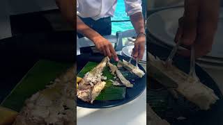 Spilia Seaside Restaurant How to serve fish properly mykonos fish serve travel greece [upl. by Nyroc13]