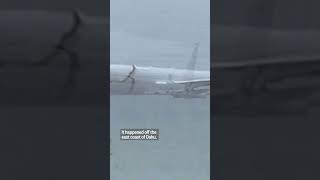 Military plane ends up in ocean after overshooting runway [upl. by Sherill]