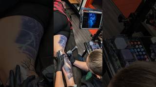 Check out our artist Fawn Baker as she works on this awesome lightning leg piece tattoo [upl. by Oremodlab]