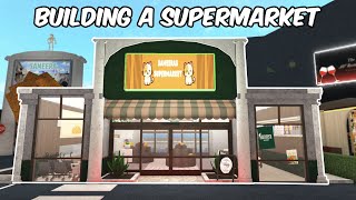 BUILDING A SUPERMARKET IN MY BLOXBURG TOWN [upl. by Hanleigh]