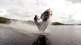 Snowmobile wheelies on water [upl. by Jonna726]