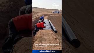 Plastic sheeting being laid down desert  The workers do their job perfectly  machine shorts [upl. by Horter254]