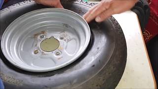 HOW TO FIT A INNER TUBE INTO A TUBELESS TRAILER TYRE BY HAND [upl. by Domini]