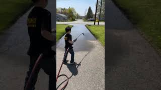 Learning how to spray driveway sealer driveway drivewaysealing sealcoating fatherandson [upl. by Anertak]