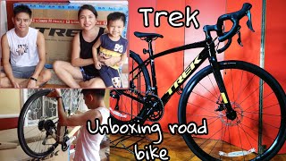 VLOG 121 UNBOXING TREK DOMANE AL2 DISC ROAD BIKEGRAVEL BIKE [upl. by Suiravad]