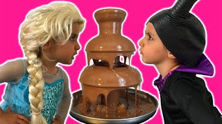 Elsa Vs Maleficent Real Life Disney Princess Movie  CHOCOLATE FOUNTAIN  Candy  10 Surprise Eggs [upl. by Aneekat]