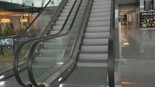 Poland Wrocław Nicolaus Copernicus Airport 1X escalator  going up [upl. by Ekenna514]