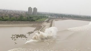 Worlds Largest Tidal Bore Forms in Chinas Qiantang River [upl. by Desai]