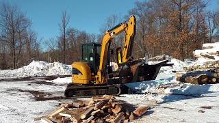 Halverson Firewood Processor on a MiniExcavator [upl. by Ahseem917]