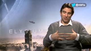 Sharlto Copley talks about how he builds his over the top character in Blomkamps Elysium [upl. by Ithnan659]