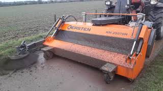 Kersten KM 25070 Sweeper clearing mud on the road with a Telehandler [upl. by Martres]