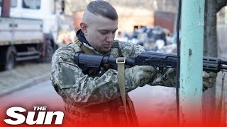 Ukrainian volunteer civilians receive military training in Kyiv [upl. by Zohara603]